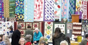 photo of hundreds of colourful quilts and handmade items made by the CGFA