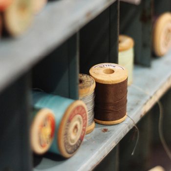  photo of antique spools of thread