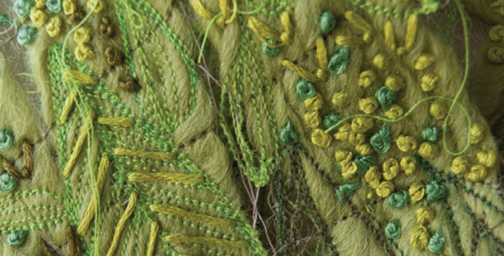 photo of leaf scarf detail with thread knots and stitching