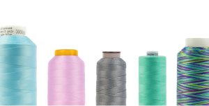 photo of a collection of different spools of thread