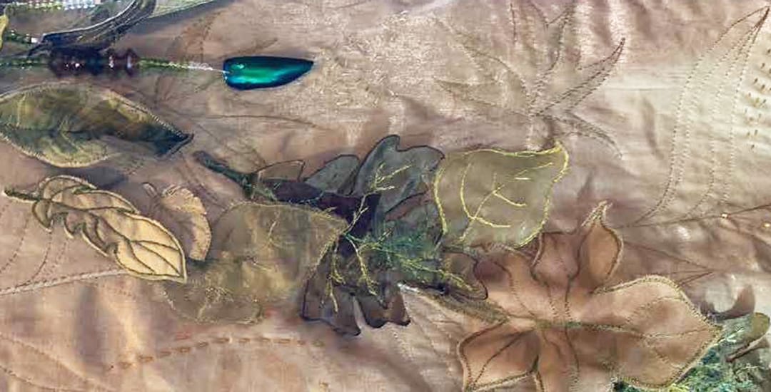 photo of a detail in the Green Woman cape