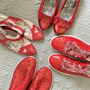 photo of four pairs of red shoes