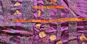 photo of a purple and gold art quilt