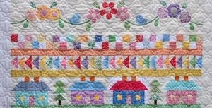 photo of several rows of the Block of the Month quilt