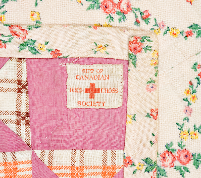 Red Cross quilt, Jan Hassard label