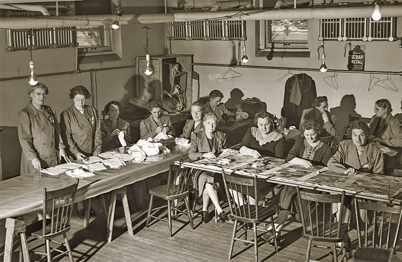 Women workers at the Red Cross Work Room in the basement of Hespeler Public Library,<br />
c. 1942. Credit Hespeler Heritage Centre. Photographer Frank Johnston.