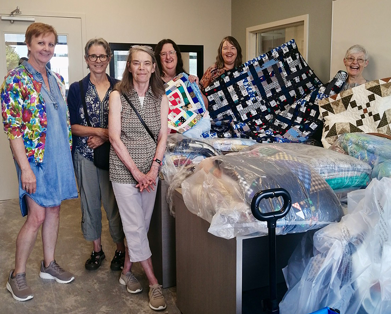 Royal City Quilters Guild donates 90 quilts to Home for Good