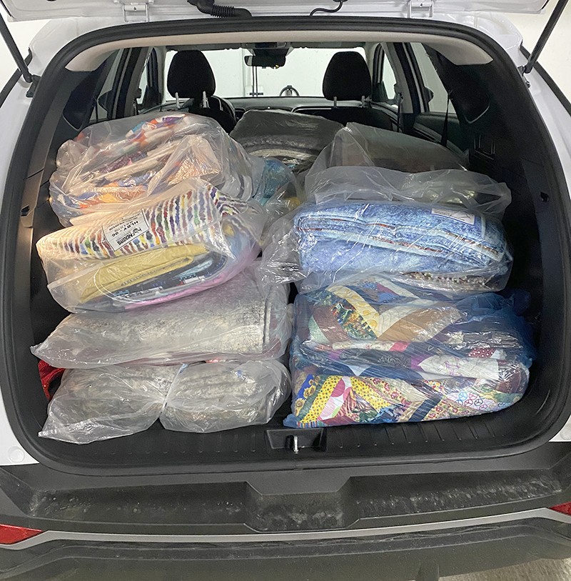 Royal City Quilters’ Guild donates 90 quilts to Home for Good