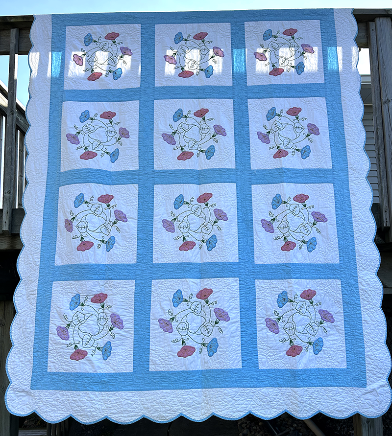 Embroidered quilt made by Margaret Mackenzie's grandmother