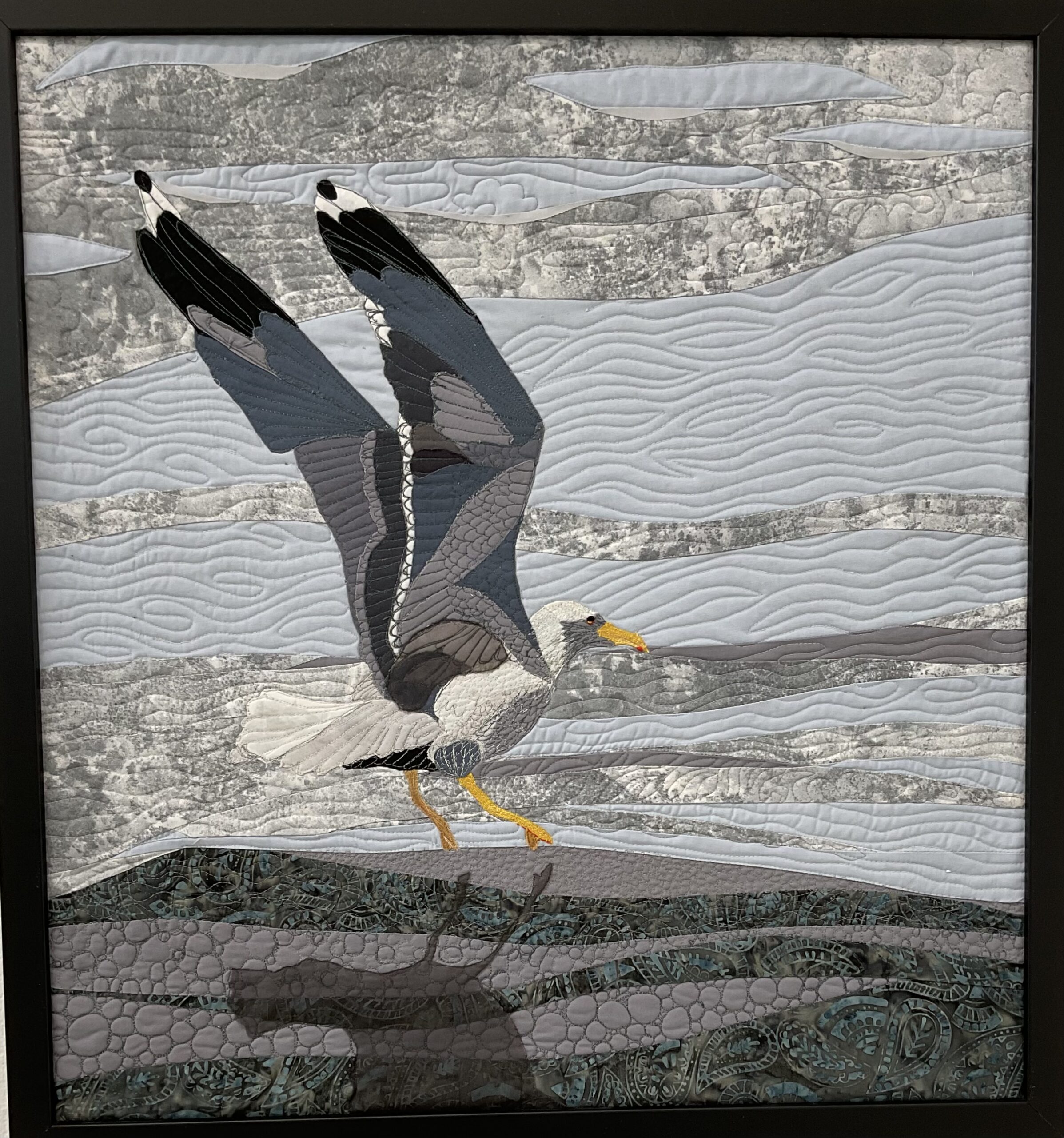 The cut away background of award-winning quilt Habitat
